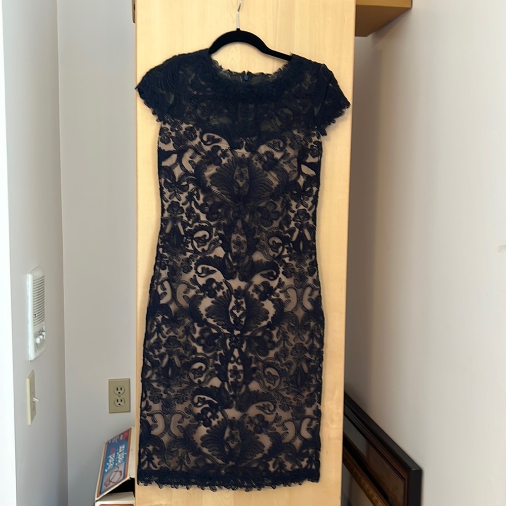 Navy blue lace dress with zippered back.